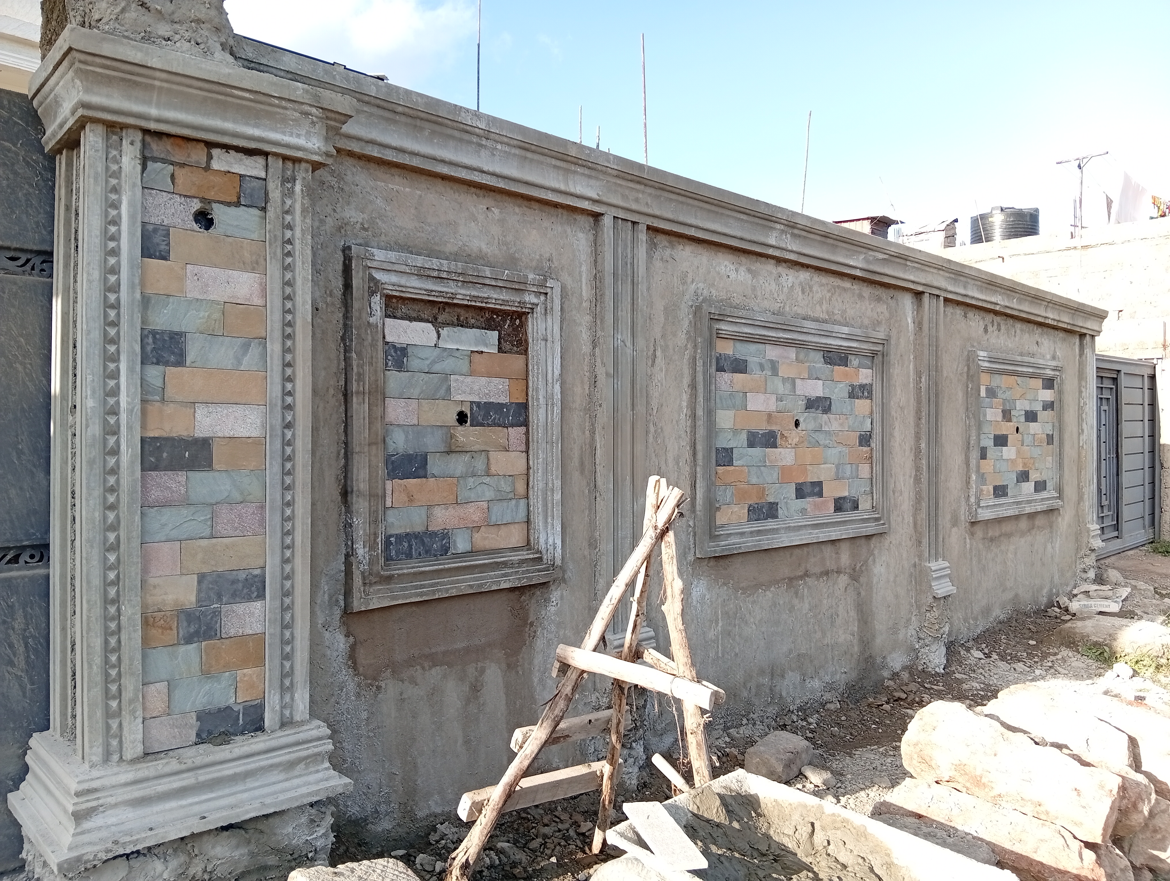 Moulding and mazeras fitting around gate area